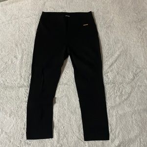 Black dress pants, size 8. Never worn but no tags.